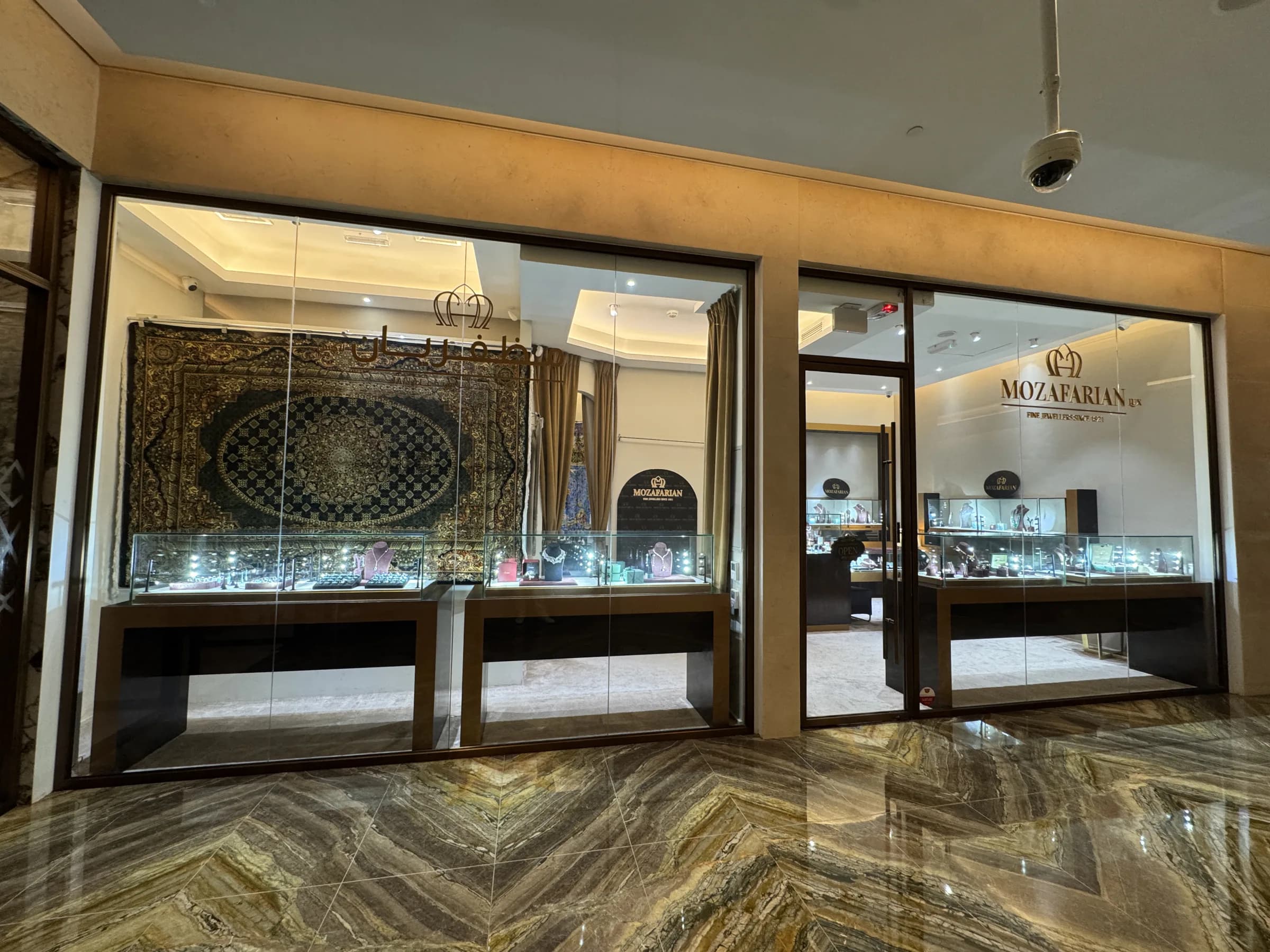 Illuminated jewellery display cases inside the Mozafarian boutique