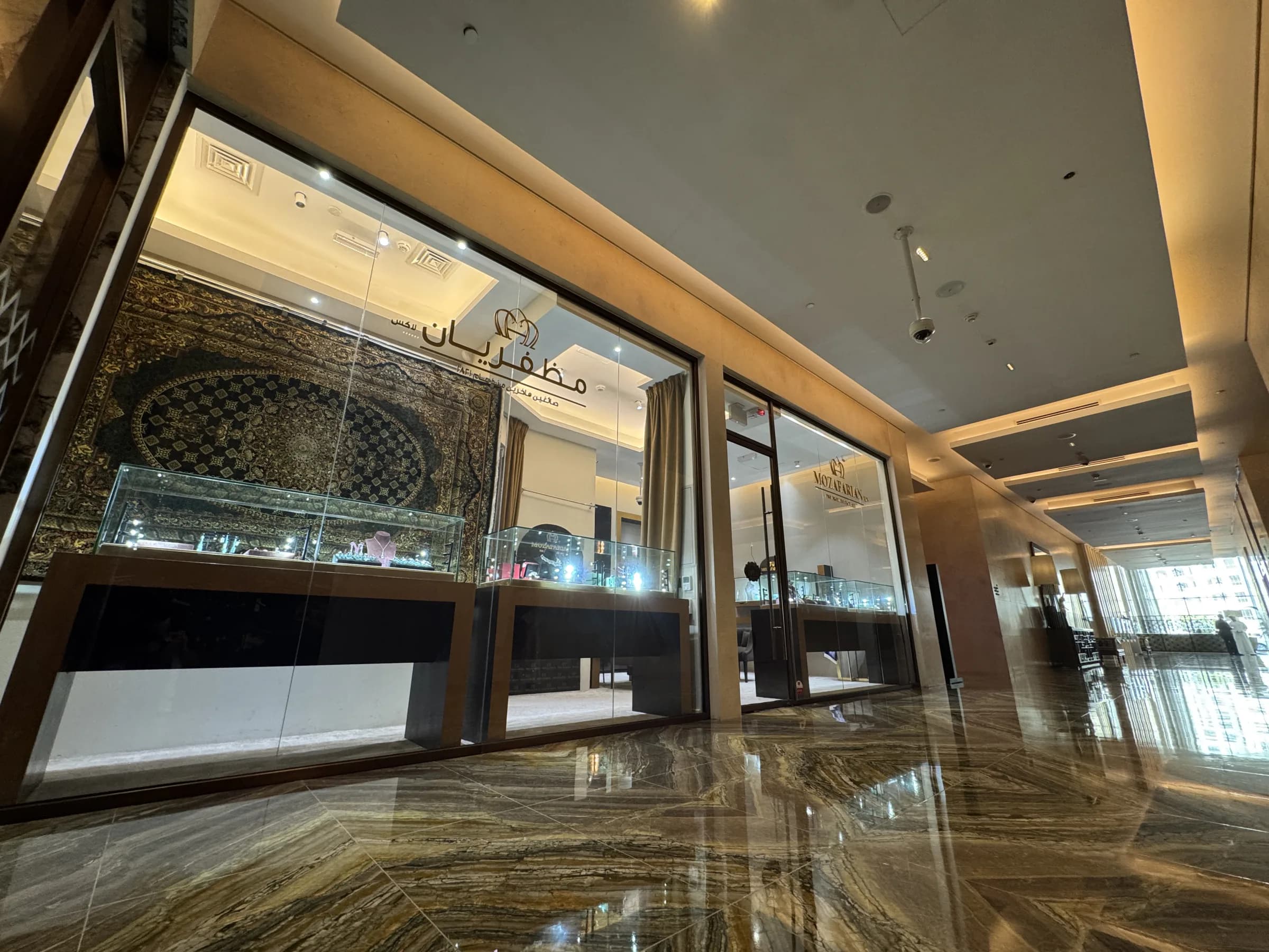 Interior display cases inside the Mozafarian Dubai boutique